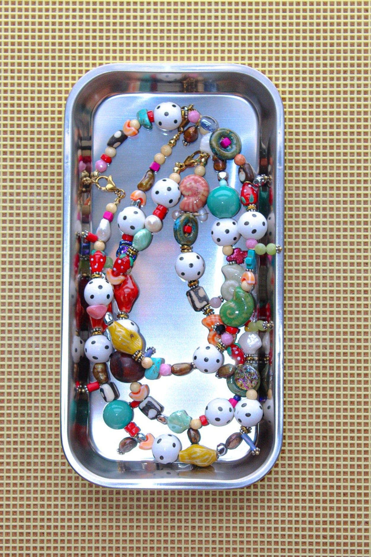 Handmade necklaces by Marveyra handcrafted in Puerto Rico featuring unique artisan designs, stainless steel details, pearls, natural-inspired elements, charms, chains, and contemporary accents. Every piece is created to stand out with an alternative, beach-inspired, unisex aesthetic and can be layered or styled for everyday wear. / Collares artesanales de Marveyra hechos a mano en Puerto Rico con diseños únicos, detalles en acero inoxidable, perlas, elementos inspirados en la naturaleza, dijes, cadenas y ac