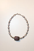 Handmade necklaces by Marveyra handcrafted in Puerto Rico featuring unique artisan designs, stainless steel details, pearls, natural-inspired elements, charms, chains, and contemporary accents. Every piece is created to stand out with an alternative, beach-inspired, unisex aesthetic and can be layered or styled for everyday wear. / Collares artesanales de Marveyra hechos a mano en Puerto Rico con diseños únicos, detalles en acero inoxidable, perlas, elementos inspirados en la naturaleza, dijes, cadenas y ac