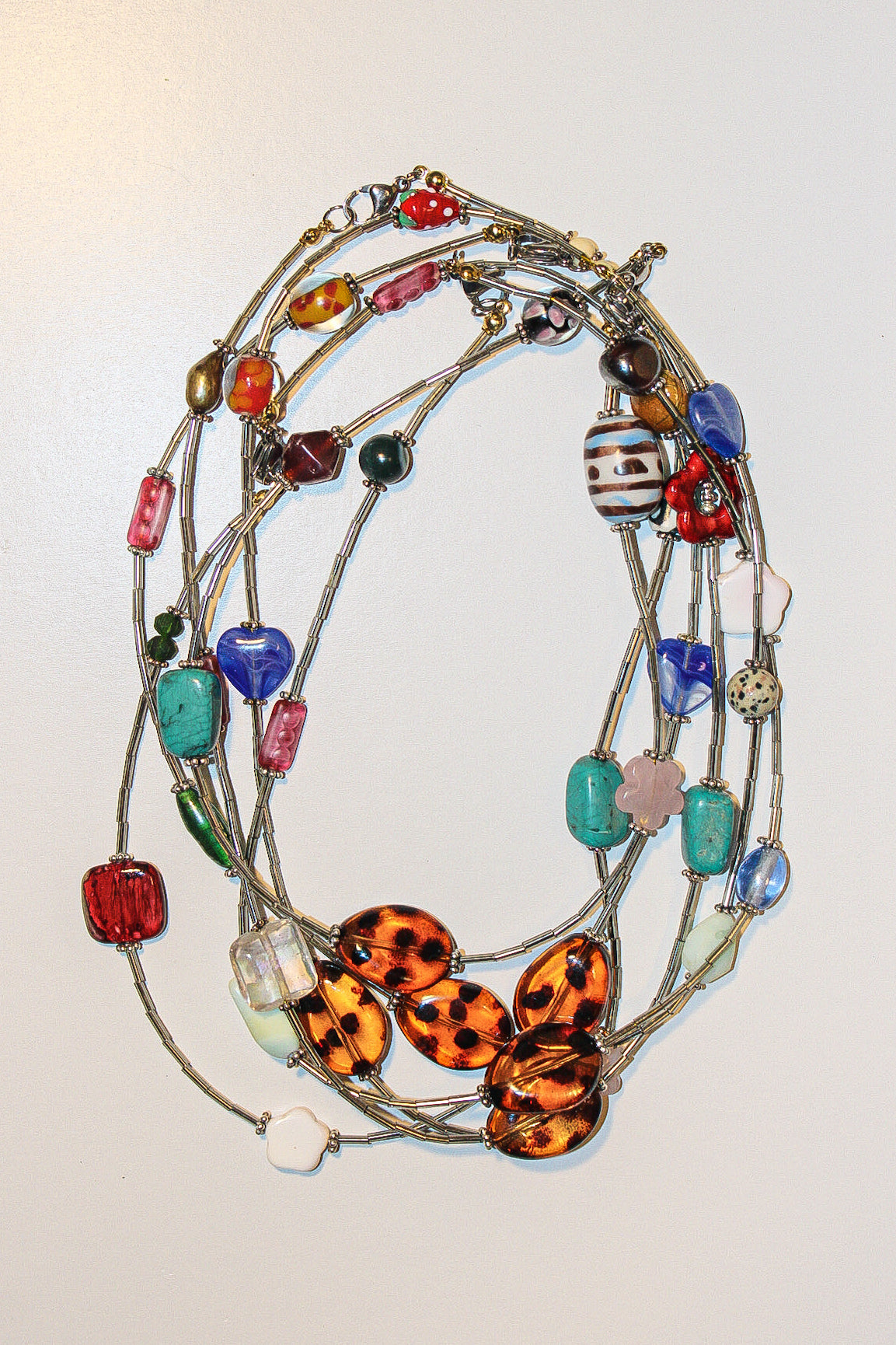 Handmade necklaces by Marveyra handcrafted in Puerto Rico featuring unique artisan designs, stainless steel details, pearls, natural-inspired elements, charms, chains, and contemporary accents. Every piece is created to stand out with an alternative, beach-inspired, unisex aesthetic and can be layered or styled for everyday wear. / Collares artesanales de Marveyra hechos a mano en Puerto Rico con diseños únicos, detalles en acero inoxidable, perlas, elementos inspirados en la naturaleza, dijes, cadenas y ac